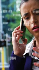 Poster - Animation of numbers over businesswoman using smartphone