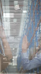 Poster - Animation of financial graphs over happy diverse female and male warehouse workers clapping hands