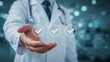 © NaesyaStudio - Doctor in lab coat presents three checkmarks floating above his open hand, symbolizing approval or success.