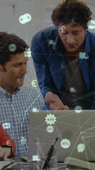 Poster - Animation of globe of digital icons over team of diverse colleagues discussing over laptop at office
