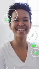 Poster - Animation of ecology icons over businesswoman smiling in office