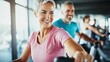 © Wannaeka - Fitness couple on exercise bikes in modern gym with natural Cancer patient does aerobic