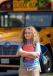© Volodymyr - Back to school. School day starts for young student. Kid student with backpack near school bus. Kid go to school. Child going to class. Schoolchild.