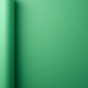 Close-up of rolled green textured paper — ideal for design mockups, craft backgrounds.