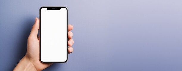Poster - Hand holding smartphone with blank white screen against soft gradient background for mockup or app design template presentation concept.