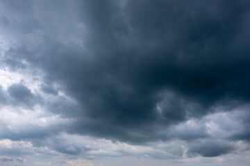 Wall Mural - dark sky with stormy clouds. dramatic sky rain,dark clouds before a thunder-storm,clouds before rain