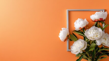 Fototapete - Soft peach background highlighting silver-framed arrangement of full peonies