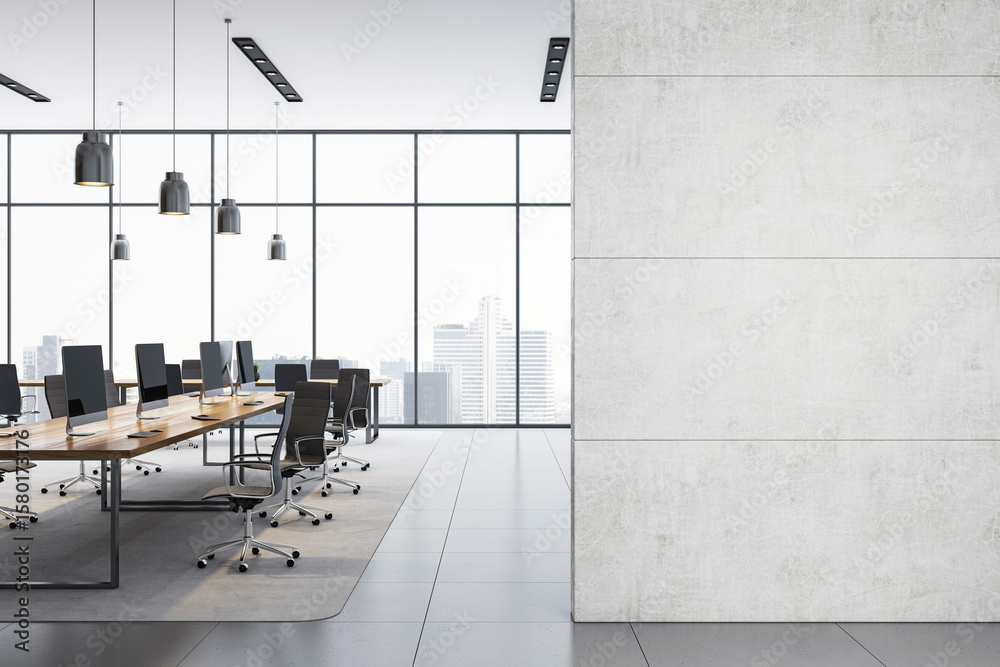 Modern empty office interior with row of desks and large blank concrete ...