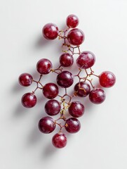 Poster - Grapes Shaped Like Molecular Clusters on a Soft White Background Create a Clean and Appealing Display for Artistic Presentations