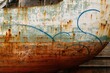 © The 2R Artificiality - Image of a weathered vessel's hull undergoing maintenance