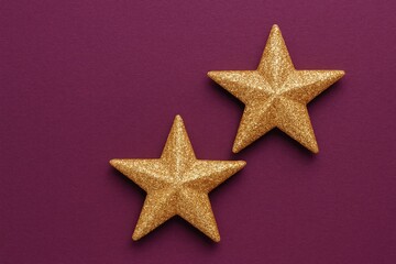 Poster - Two golden stars displayed on a purple background with Christmas decorations