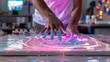 © Artistry - The Artful Touch: Hands Immersed in Vibrant Neon Paint Creating a Mesmerizing Swirling Design on the Canvas with Artistic Flair.