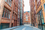 A view down a side street forming an urban canyon  in Manchester,UK in summertime