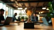 © Sirichat. Camphol - Trophy presented to best employee of the year, workplace background, proud face