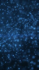 Poster - Floating blue particles suspended in a dark ambient space, resembling glowing dust or atmospheric digital snow