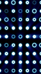 Poster - Futuristic glowing rings forming a grid of circular light patterns with radial beams on a dark background