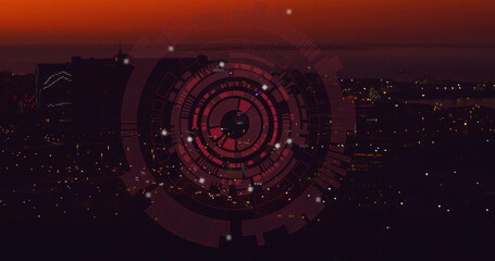 Poster - Overlaying digital interface with rings and nodes over high-rise buildings and city lights at dusk