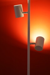 Poster - A simple red wall with two lights on it