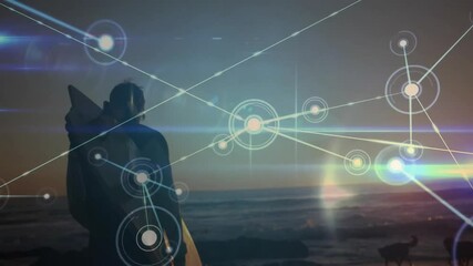 Poster - Surfer standing at sunset horizon initiating technology network streaming over sea with dog walking