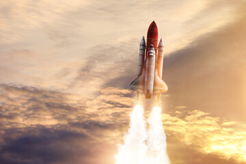 Wall Mural - modern space rocket in beautiful cloudy sky