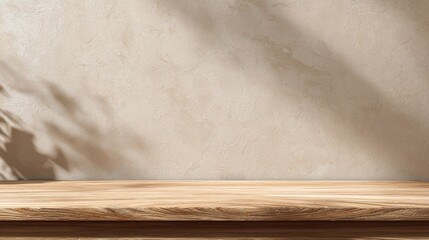 Poster - Cream-colored wall with subtle light and shadow patterns, showcasing a light wood surface ideal for product placement or design presentation.