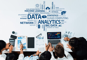 Poster - A diverse group of professionals collaboratively analyzing data in a modern office setting, utilizing charts, graphs, and technology to support informed decision-making and business strategies. Amity