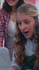 Poster - Animation of mathematical equations over schoolchildren using laptop
