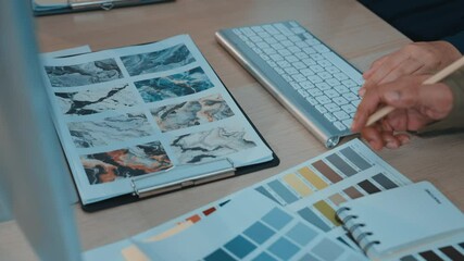 Poster - A creative workspace showcasing designers collaborating on color palettes and texture samples, emphasizing artistic processes and teamwork in modern interior design projects. SACTR