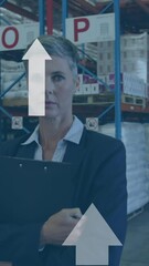 Poster - Animation of arrow icons moving upwards against portrait of caucasian female supervisor at warehouse