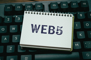 Poster - There is notebook with the word Web5. It is as an eye-catching image.