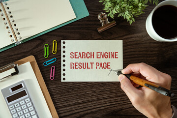 Poster - There is a piece of paper with the word Search Engine Result Page. It is as an eye-catching image.