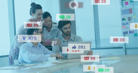 Poster - Collaborating four coworkers analyzing laptop social media icons in meeting room, with coffee cups