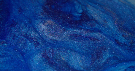 Wall Mural - Ink stream. Floating splash. Defocused bright blue color spatter shimmer water texture spreading on abstract creative art background.