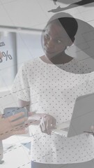 Poster - Business data charts and graphs animation over two women discussing in office