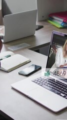 Poster - Watching animation on laptop, businessman engaging with social media icons in office