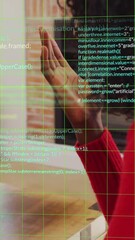 Poster - Animation of multicolored computer language over african american woman talking on videocall