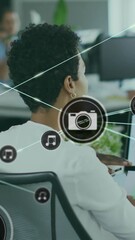 Poster - Animation of connected icons over diverse female coworkers discussing reports on computer