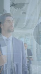 Poster - Animation of infographic interface over caucasian businessman walking with bag in office