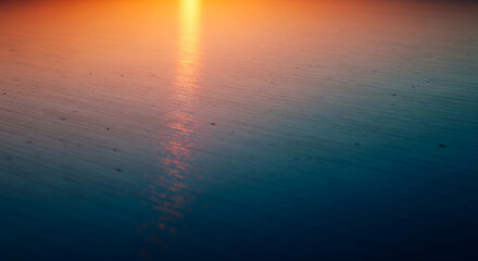 Poster - Sunset reflection on textured surface, gradient from orange to teal, creating a serene and calming visual effect, ideal for background or design element