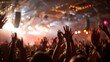 © Naiuang - A dynamic indoor festival scene filled with a crowd of raised hands swaying to the rhythm of the music