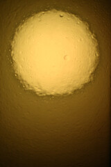 Wall Mural - Gold glitter circle of light shine sparkles and golden spark particles in circle frame on black background. Christmas magic stars glow, firework confetti of glittery ring shimmer	