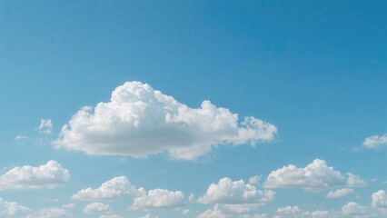 Wall Mural - soft white clouds floating in a bright blue sky background