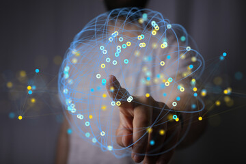 Poster - Abstract image of a hand interacting with a digital network sphere.  Represents connectivity, data, and technology.