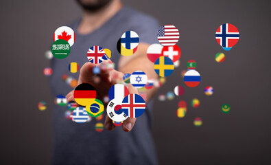Poster - Image of a person connecting with various countries' flags, symbolizing international business or global communication.