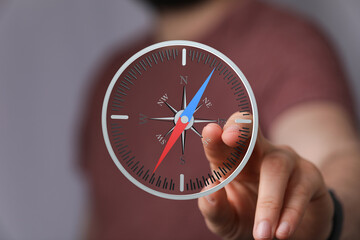 Poster - A man interacts with a digital compass, finding direction and guidance.  Perfect for business, travel, and technology concepts.