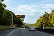 © Austockphoto - wear a seatbelt correctly penalties apply on digital highway sign during seatbelt safety campaign