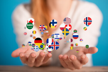 Poster - Image of hands holding many flags representing global communication and international business.
