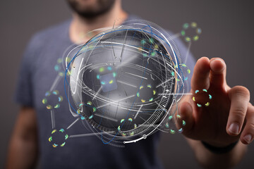 Poster - Stock photo of a person interacting with a digital globe, representing global network, technology, and connectivity.