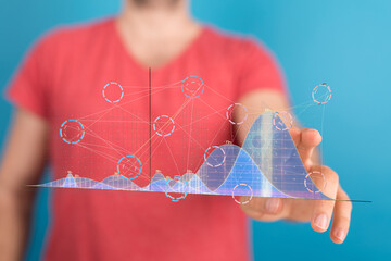Poster - A man interacts with a holographic graph showcasing data analysis and insights.