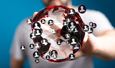 Poster - Image of a person holding a digital globe showing connections between people.  Global networking concept.